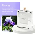 Do Son floral reed diffuser in rectangular glass bottle with cork stopper and iris accents - Tuberose