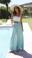 Detail of high waisted floral wide leg pants with drawstring and white tube top set - S / Bottoms / Blue Floral Print