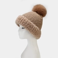 Detail of khaki knitted beanie featuring soft faux fur lining and a plush top pompom - Single Pom Pom / Khaki