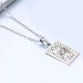 Detailed close-up of a silver stainless steel Scorpio zodiac pendant on a standard cable chain - Scorpio / Steel