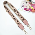 Detail of pink and beige patterned crossbody phone strap with gold adjustable metal buckle - Pink Coffee Plaid - Gold Buckle