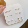 6 pairs of silver floral stud earrings set with pink resin hearts and roses - MAG1 Magic Heart 6-Piece Set