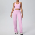 Detail of pink halter sports top and high-waist wide-leg yoga pants workout set - S / Top And Bottom / Sakura Pink