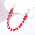 Detail of red and white hand-woven strap with silver metal buckles on white background - 12mm Width / Red