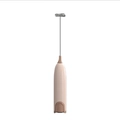 Handheld electric milk frother with a pink ergonomic handle and stainless steel whisk - Pink
