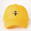 Adjustable bright yellow baseball cap featuring a bumblebee embroidery on a curved brim - Bright Yellow