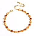Detail of gold evil eye bracelet with orange enamel charms and dark red zircon accents - Orange Enamel Dark Red Zircon Style (Gold 5)