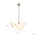 Minimalist white bird Christmas pendant in nordic style with gold trim and metal tag - White Dove