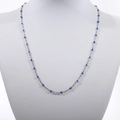 Detail of silver bead chain necklace with dark blue enamel beads on a neck mannequin - Silver + Royal Blue
