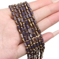 Oval purple crystal beads with gold trim for DIY jewelry making held in hand - Approx 50pcs/Strand / 3x5mm / Solid Purple
