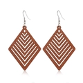 Macro detail of geometric hollow V-shaped wooden rhombus earrings on a white background - Style 62