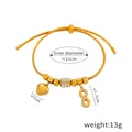 Verstellbares goldenes Schlangenarmband mit Herz und Kristall-Unendlichkeitssymbol - Herz und Unendlichkeitsanhänger / Gold