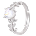 Macro detail of leaf-shaped ring with round brilliant cut zircon and pave leaf accents - Adjustable Open / Silver