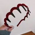 Detail of red velvet flocked wavy headband with non-slip teeth for secure styling - Wave Toothed Style / Burgundy