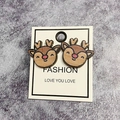 Christmas reindeer wooden stud earrings with cute cartoon design and natural wood texture - Reindeer