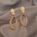 Minimalist layered oval gold earrings with a frosted metallic finish on silk - Layered Oval Geometric Drops / Gold