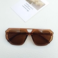 Lunettes de soleil géométriques ambre transparent avec verres bruns et double pont - Thé Noir