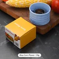 Blue corn stripper tool with stainless steel blade and 35g packaging box on wooden board - Box Packaging / Blue