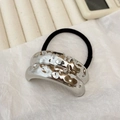 Minimalist silver liquid metal alloy hair tie with a black elastic band for ponytails - Double Layer Pleated Silver