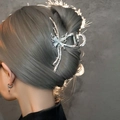 Detail of silver y2k metal butterfly hair claw clip worn on grey hair - Shiny Silver Butterfly with Artificial Pearl (FJ1487)