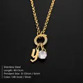 Elegant 14K gold plated stainless steel necklace with lowercase 'y' and sparkling crystal - Letter Y