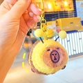 Cute Capybara plush keychain wearing a yellow bee costume with a small yellow bell - Round Bee Capybara