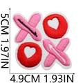 Detailed macro view of XOXO embroidered heart patch with size markings in centimeters - No.27-XOXO Heart Combo