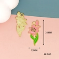 Detail view of pink enamel flower pendant with 31mm height and 13mm width dimensions - Pink Lily