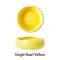 Bright yellow ceramic pet bowl with wavy rim design and smooth glazed surface - Single Yellow Flower Bowl