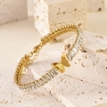 Elegant gold butterfly bracelet featuring rectangular zircons and a matte finish charm - Butterfly/Brushed Finish