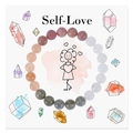 Detalle de cuentas de piedra natural de colores rodeando una tarjeta de arte Self-Love - Self-Love-3