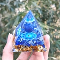 Orgone energy pyramid with blue lapis lazuli, gold foil, and ying-yang symbol - Style 68