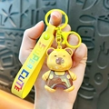 Cute cartoon capybara keychain with rotating face and yellow strap charm - Strap Style - Yellow