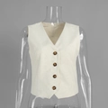 Close-up of off-white cotton linen vest showing V-neck and four brown buttons detail - S / Apricot