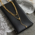 Double-layered 18K gold plated titanium necklace with V-shaped letter pendant - Gold