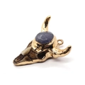 Golden cow skull pendant with blue stone inlay and natural resin texture detail - No.2 (Blue-Grey Gemstone)