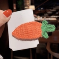 Cute carrot shaped crochet hair clip with orange yarn body and green leaves detail - J-15-Carrot Style