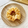 Yellow scrunchie with white daisy pattern on a rustic wooden tray decoration - Yellow Floral