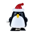 Detail of penguin clockwork toy with red Christmas hat and side winding mechanism - Wind-up Walking Fat Penguin