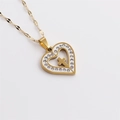 Gold stainless steel heart necklace with crystal cross pendant on a white background - Rhinestone Cross Heart