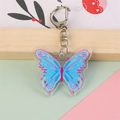 Simpatico portachiavi a farfalla in acrilico blu e rosa con anello per borsa - Farfalla Blu Rosa