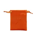 Macro detail of soft orange velvet jewelry drawstring pouch with satin ribbon closure - Orange