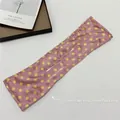 Deft bun hair tool in dusty pink with yellow polka dots made of satin fabric - Dusty Pink Yellow Polka Dot