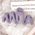 Elegant wavy purple hair claw clip in jelly finish for modern styling - Purple