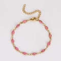 Detailed view of golden bracelet featuring pink glitter marquise charms and lobster clasp - 18+5cm / Pink
