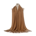 Detail of caramel knit cashmere scarf showing soft texture and elegant fringe tassels - Rice Camel