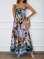 Detailed view of the vibrant floral maxi dress with unique blue scallop trim on the hemline - Purple Black Large Floral