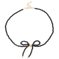 Elegant black beaded necklace with a golden heart bow pendant and adjustable chain - Black Faceted Bead Bow Heart Necklace (7395) / Black