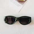 Dunkelgrüne Vintage-Sonnenbrille in ovaler Form aus Acetat für Damen im Retro-Look - Grün