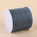 Fil de nylon gris-bleu 0,8 mm pour bijoux sur bobine en plastique blanc - 0,8 mm x 50 m / Bleu Brume